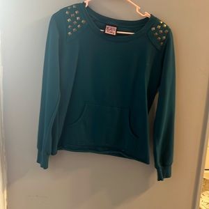 Fits like a girls size 10/12. Girls small. Sweatshirt material